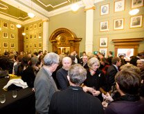People gathered for an exhibition opening